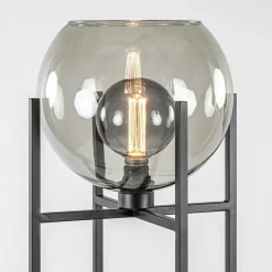 Frame vloerlamp mat zwart met smoke glazen bol