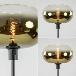 Mat zwarte vloerlamp met glazen kap helder/goud
