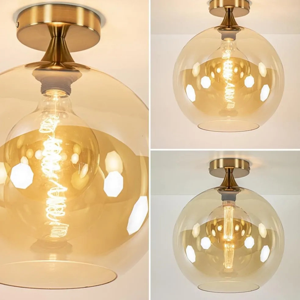 Plafondlamp goud met amber glazen bol 30 cm