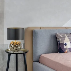 Trendy tafellamp keramiek goud met zwarte kap