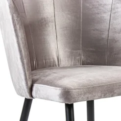 Velvet roze eetkamerstoel met zwart metalen pootjes